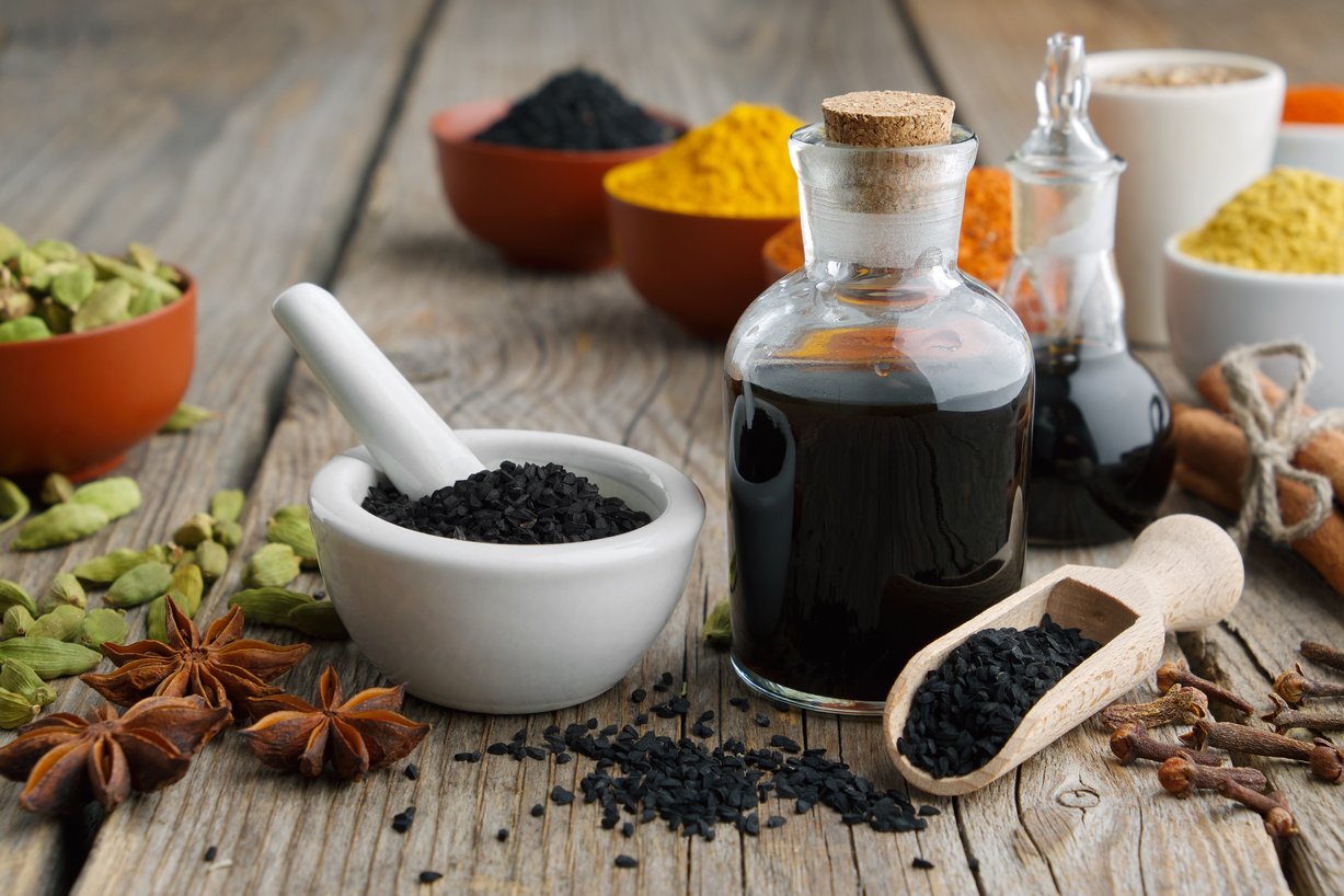 Black Cumin Seed Oil in Glass Jar with Ingredients