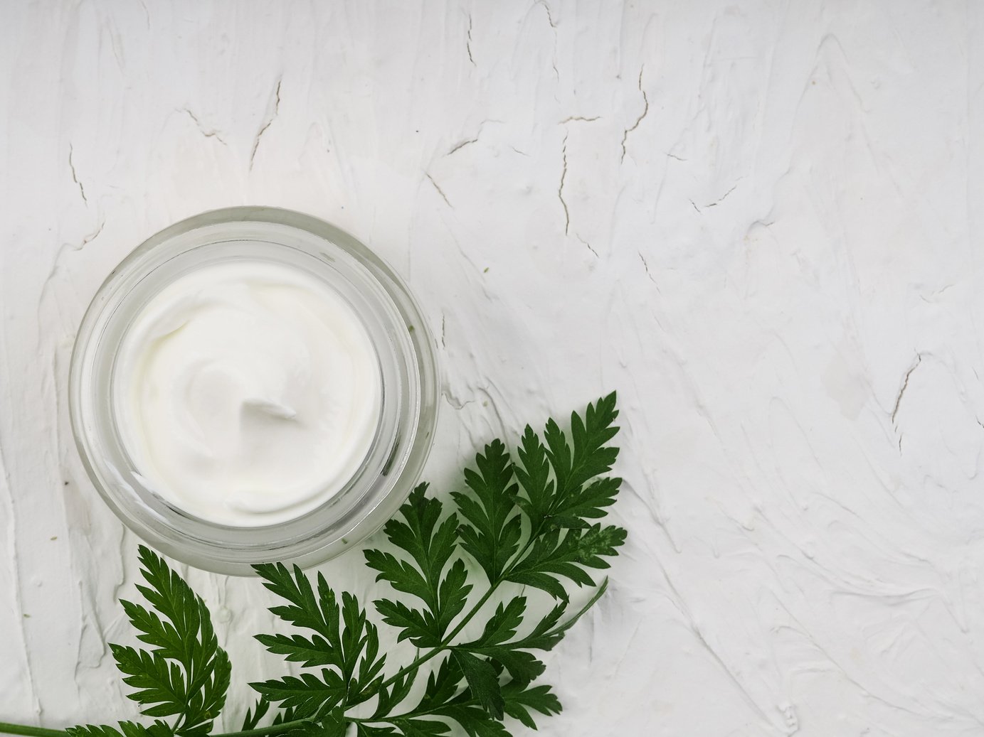 face and body cream on a white background, self-care, health and beauty